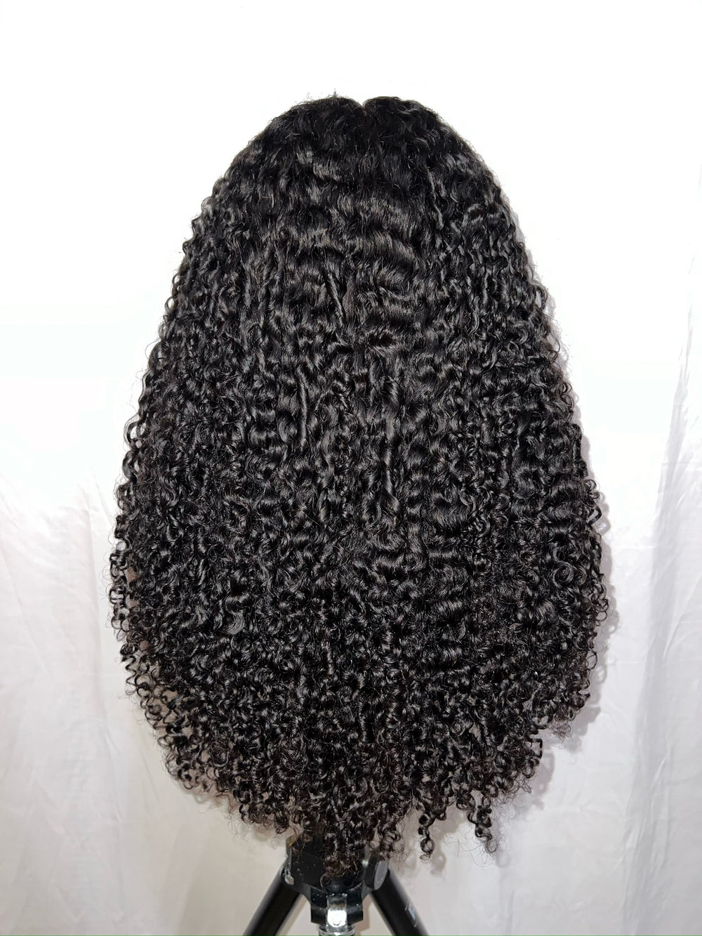 chic curtain bangs and is crafted from 100% human virgin kinky hair