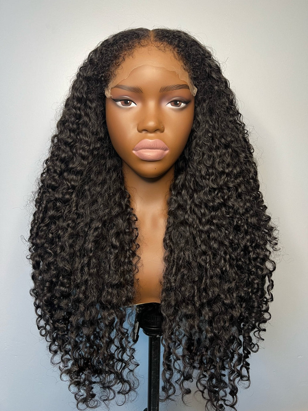 chic curtain bangs and is crafted from 100% human virgin kinky hair