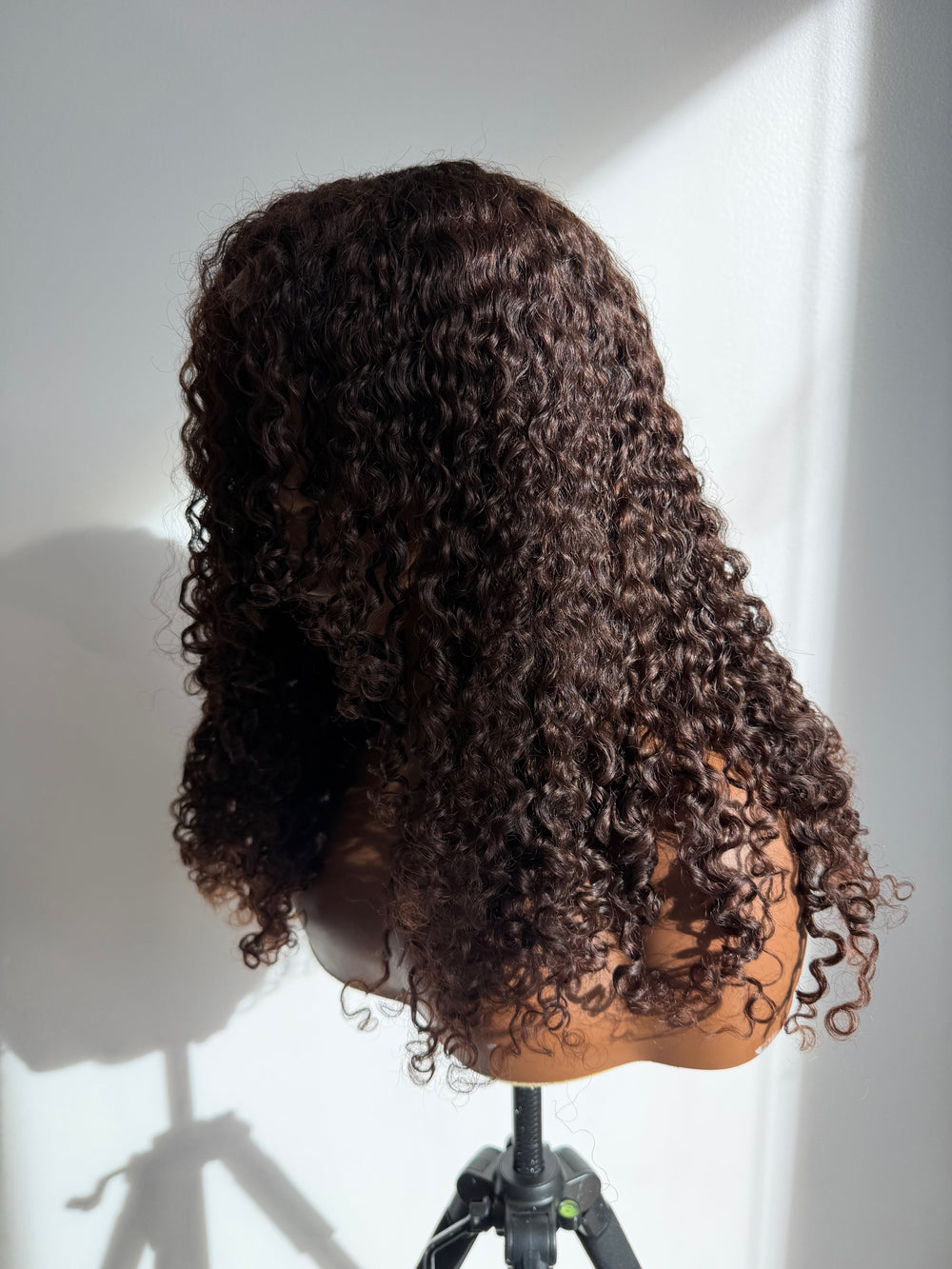 chic curtain bangs and is crafted from 100% human virgin kinky hair