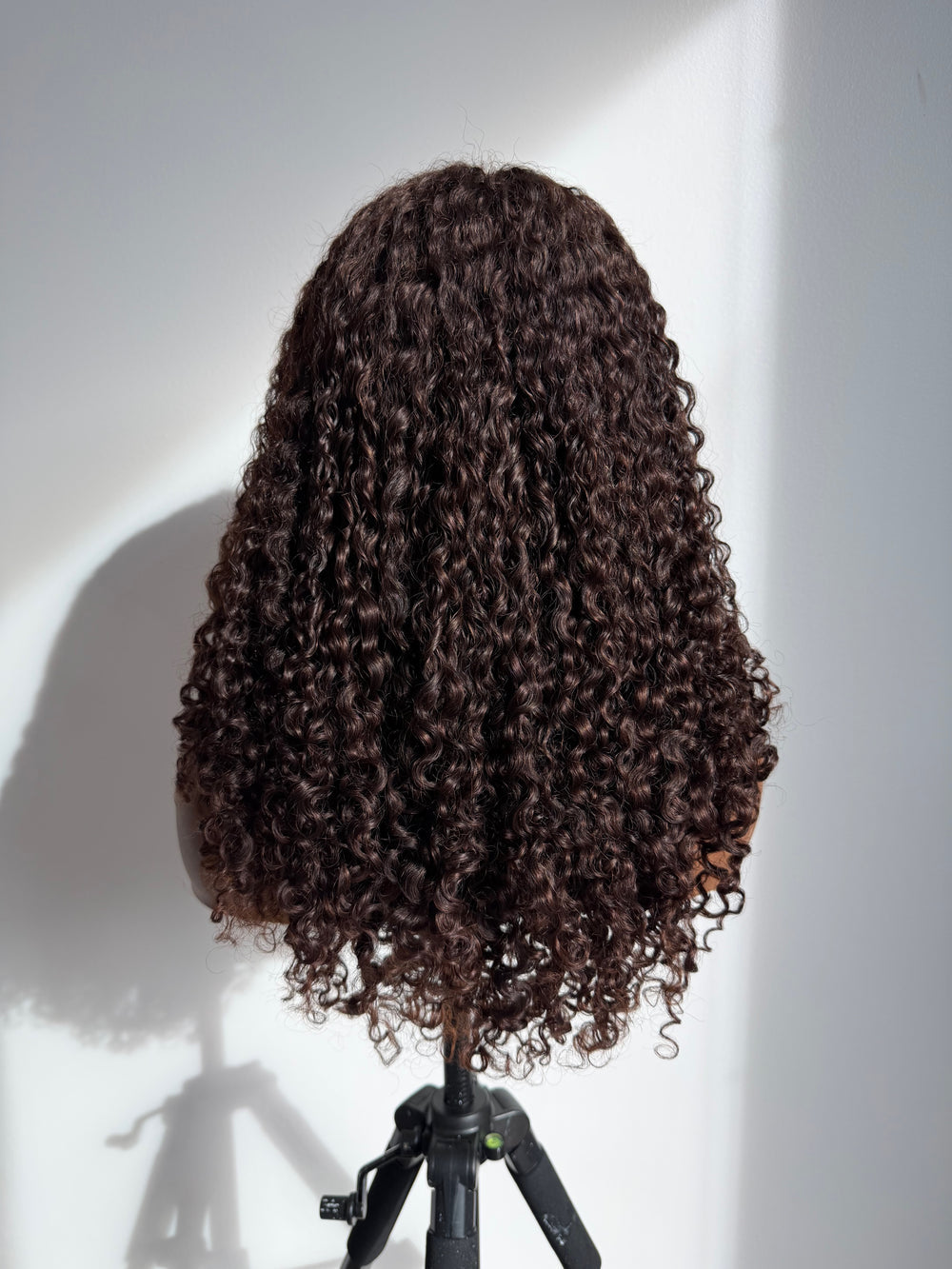 chic curtain bangs and is crafted from 100% human virgin kinky hair